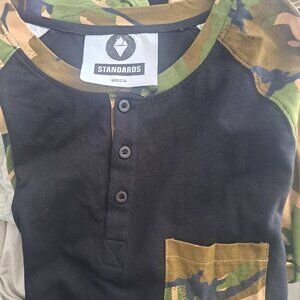 Standards brand long-sleeve Henley featuring a black body with camouflage-patter